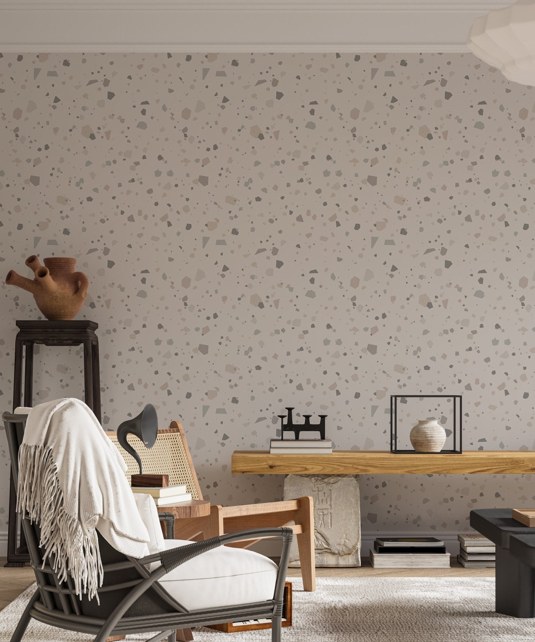 Terrazzo wall mural in a living area featuring a wooden rocking chair.