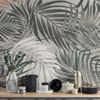 Home interior with a large scale grey leaf wall mural.
