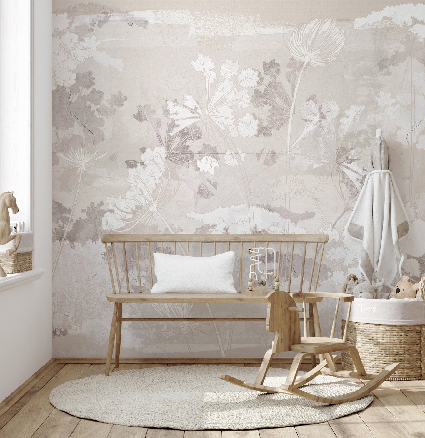 Textured floral wall mural in a nursery featuring a wooden rocking horse.