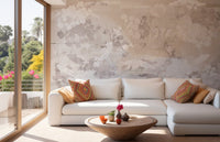 Abstract garden wall mural paired with a white sectional sofa and coffee table.