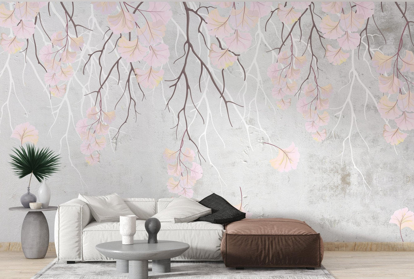 Minimalist living room wall mural with pink blossom branches.