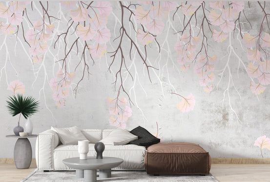 Minimalist living room wall mural with pink blossom branches.
