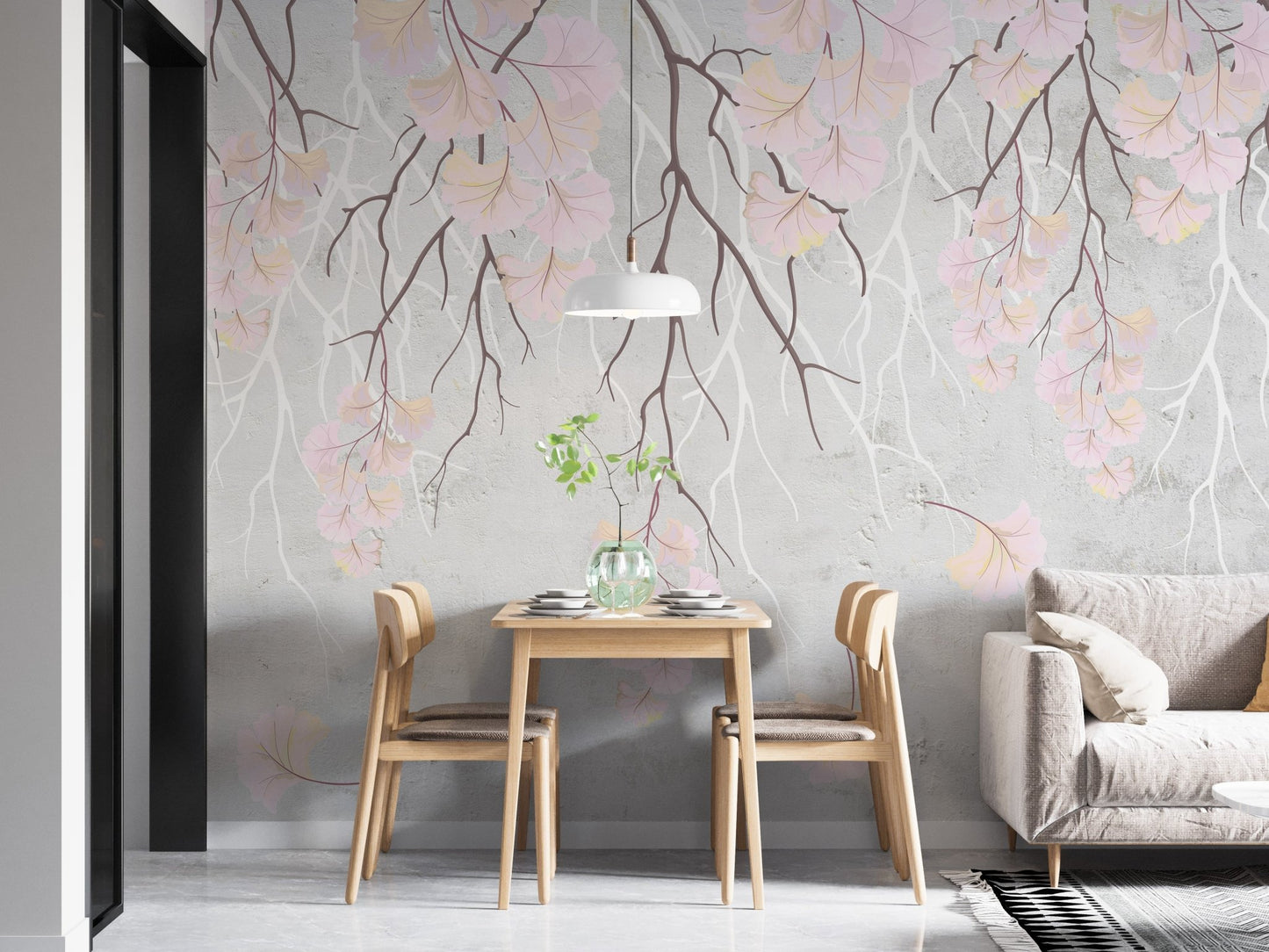 Floral branches on soft pink wall mural in minimalist dining room.