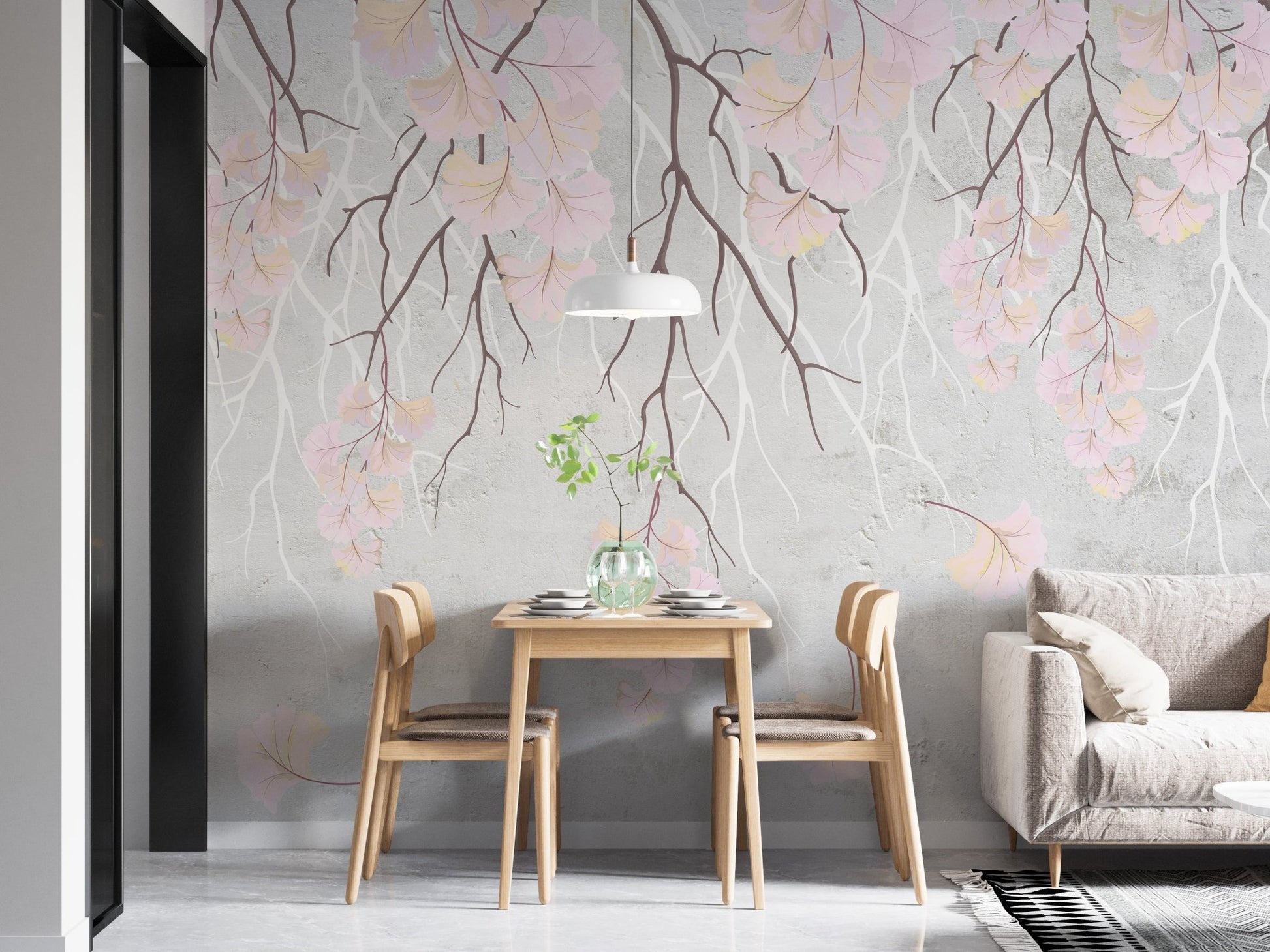 Floral branches on soft pink wall mural in minimalist dining room.