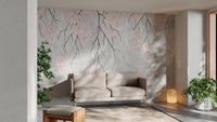 Floral wall mural featuring pink cherry blossoms in a bright living area.