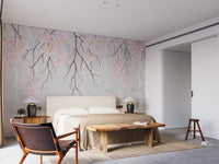 Bedroom wall mural with pink floral patterns in sunlit bedroom.