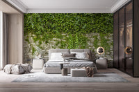 Botanical leaves wall mural featuring vines and stones in a luxury master suite.