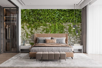 Hanging Green Leaves Wallpaper Murals behind a large bed in a contemporary room.