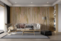 Earthy tone wallpaper with layered hanging leaf illustrations n living area.