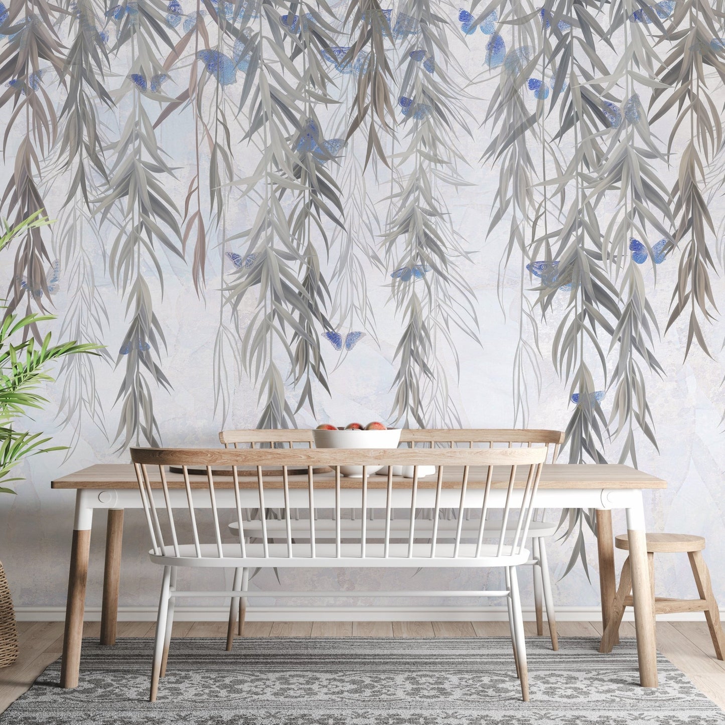 Willow pattern wall mural in small dining room with hanging flower.