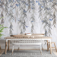 Willow pattern wall mural in small dining room with hanging flower.