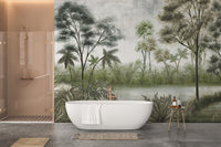 Hazy Forest Wall Mural behind a white freestanding bathtub in a bathroom.