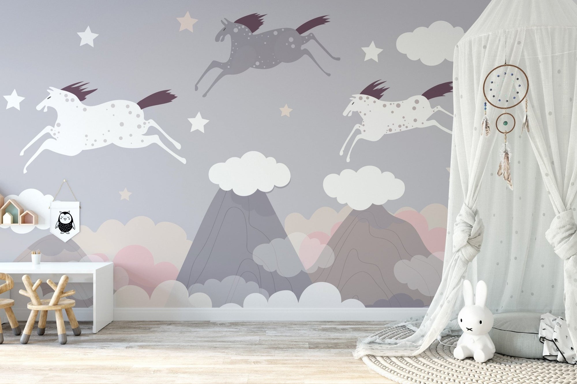Majestic horse herd mural with a serene, heavenly ambiance in kids room.
