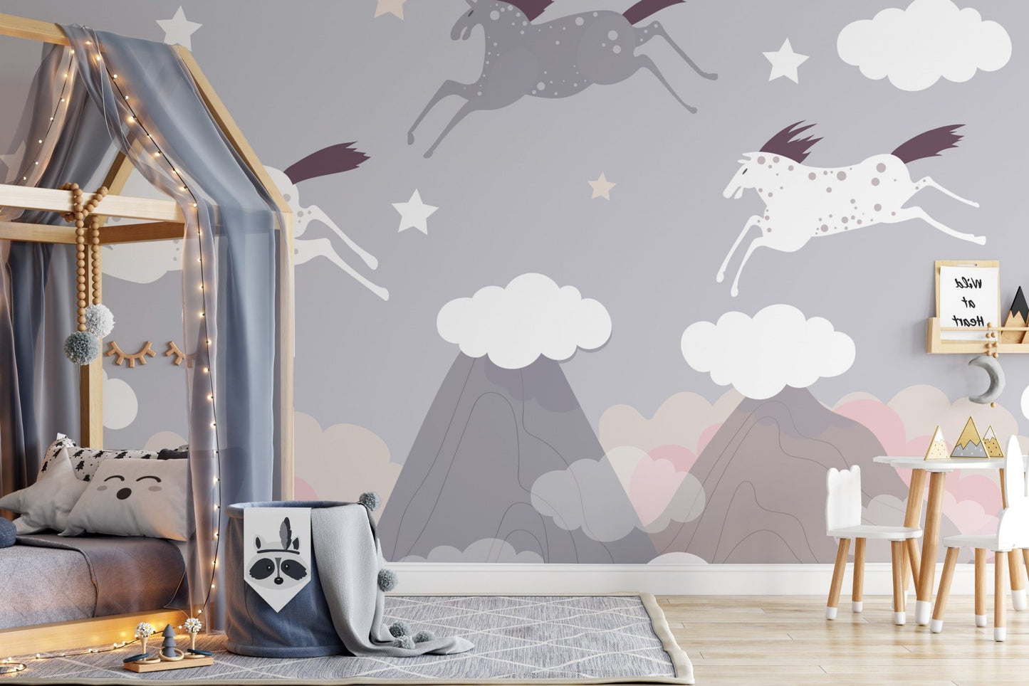 Graceful horse herd mural with a touch of celestial beauty in toddler room.
