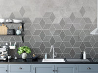 Kitchen splashback area with grey concrete tiles effect wall mural.