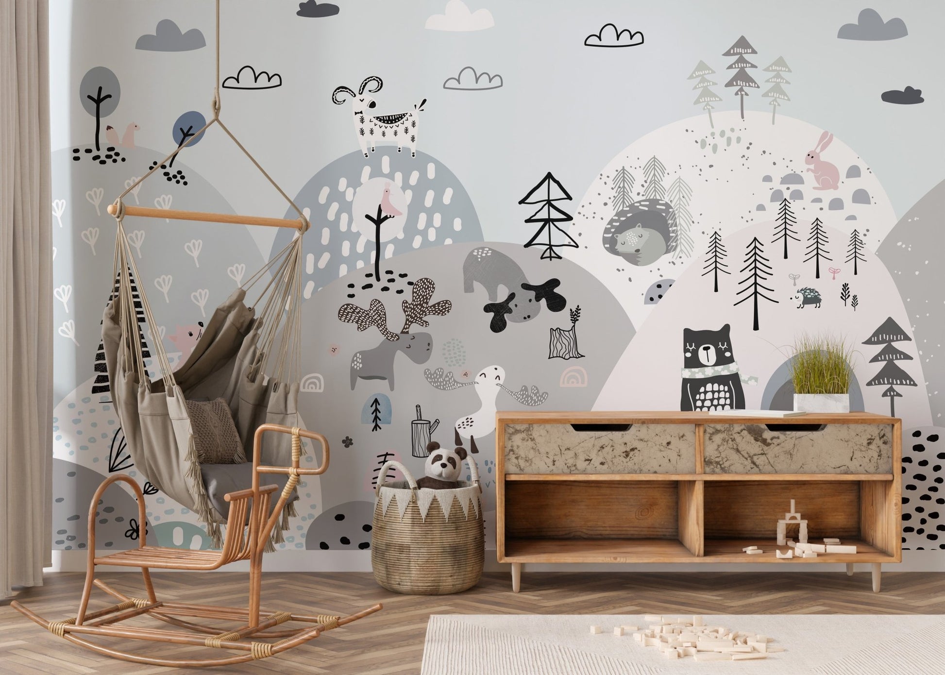 Bright and cheerful hillside mural with playful cartoon animals in kids room.



