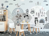 Whimsical mural featuring cartoon creatures on a grassy hillside in kids dining area.
