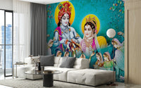 Radha krishna wall mural with golden halos and traditional attire.