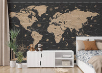 Gold-leaf world map mural with vintage vibe
