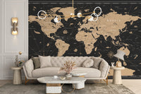 Antique world map mural in gold tones
