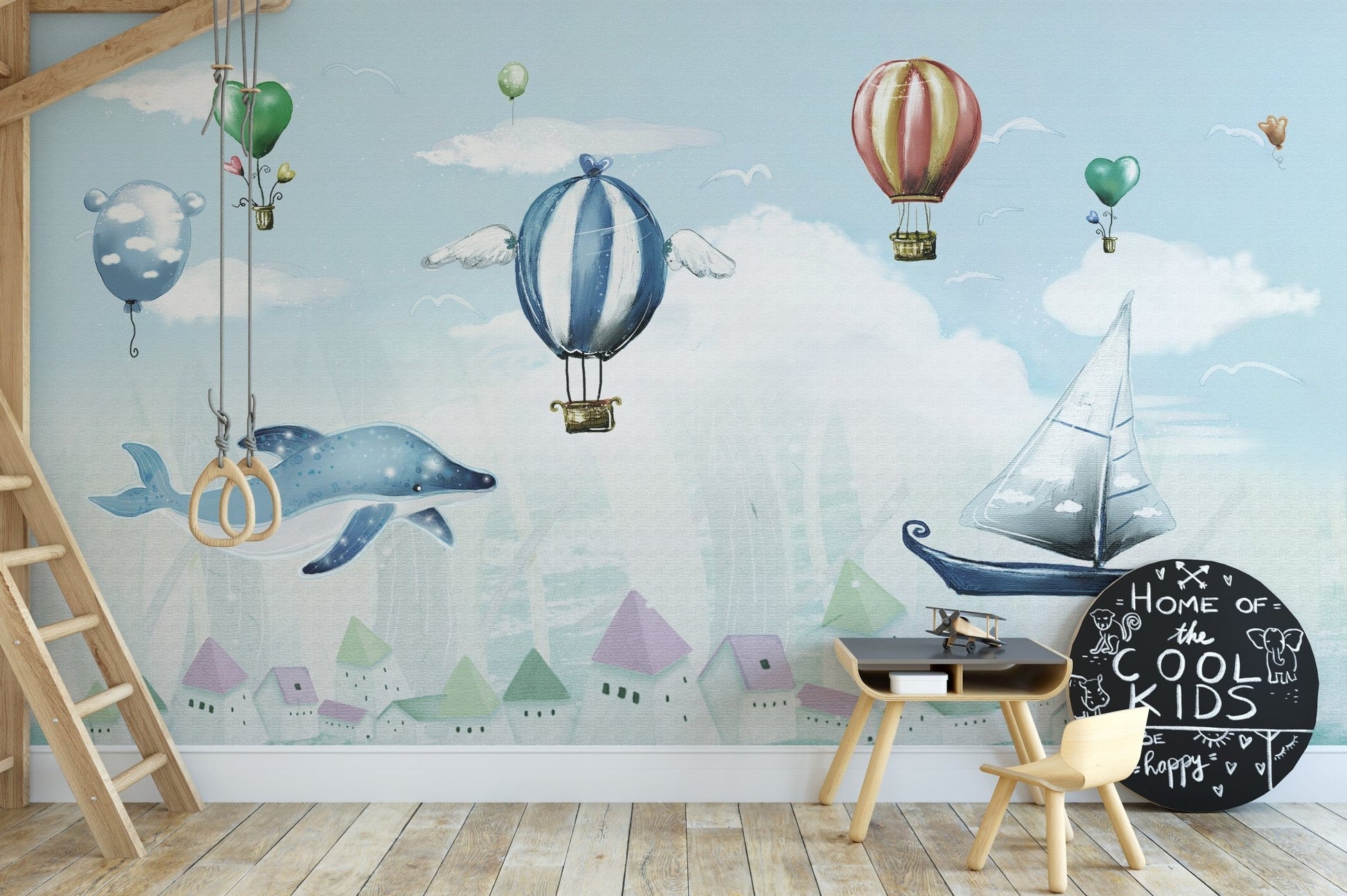 Watercolor hot air balloon wall mural in kids room with wooden chair.