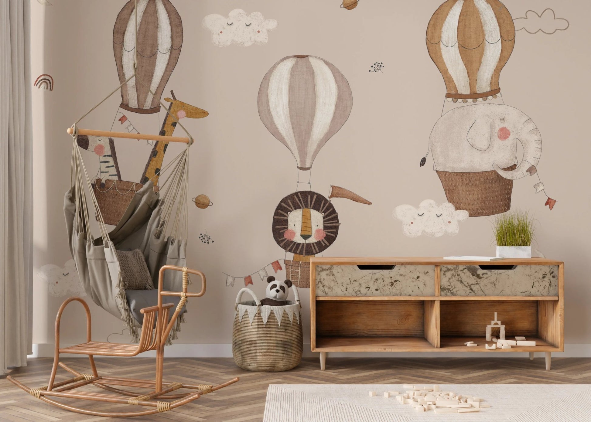 A safari themed wallpaper featuring large floating balloons.