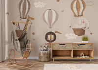 A safari themed wallpaper featuring large floating balloons.