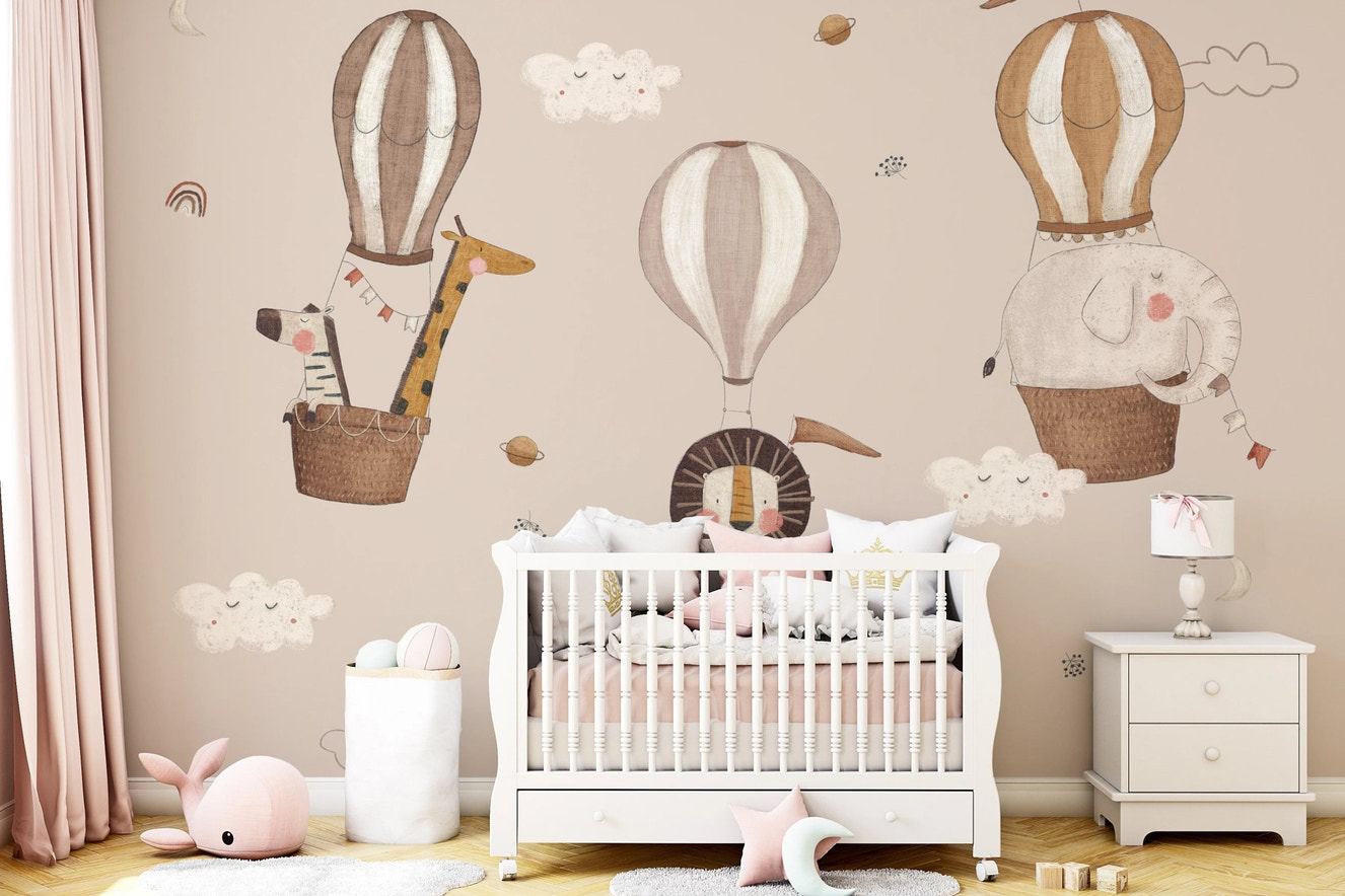 Vintage hot air balloon safari wall mural in soft pastel tones.