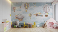Scenic mountain and balloon wallpaper in soft pastel shades.