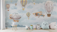 Watercolor hot air balloon wall mural in soft blue and beige tones.