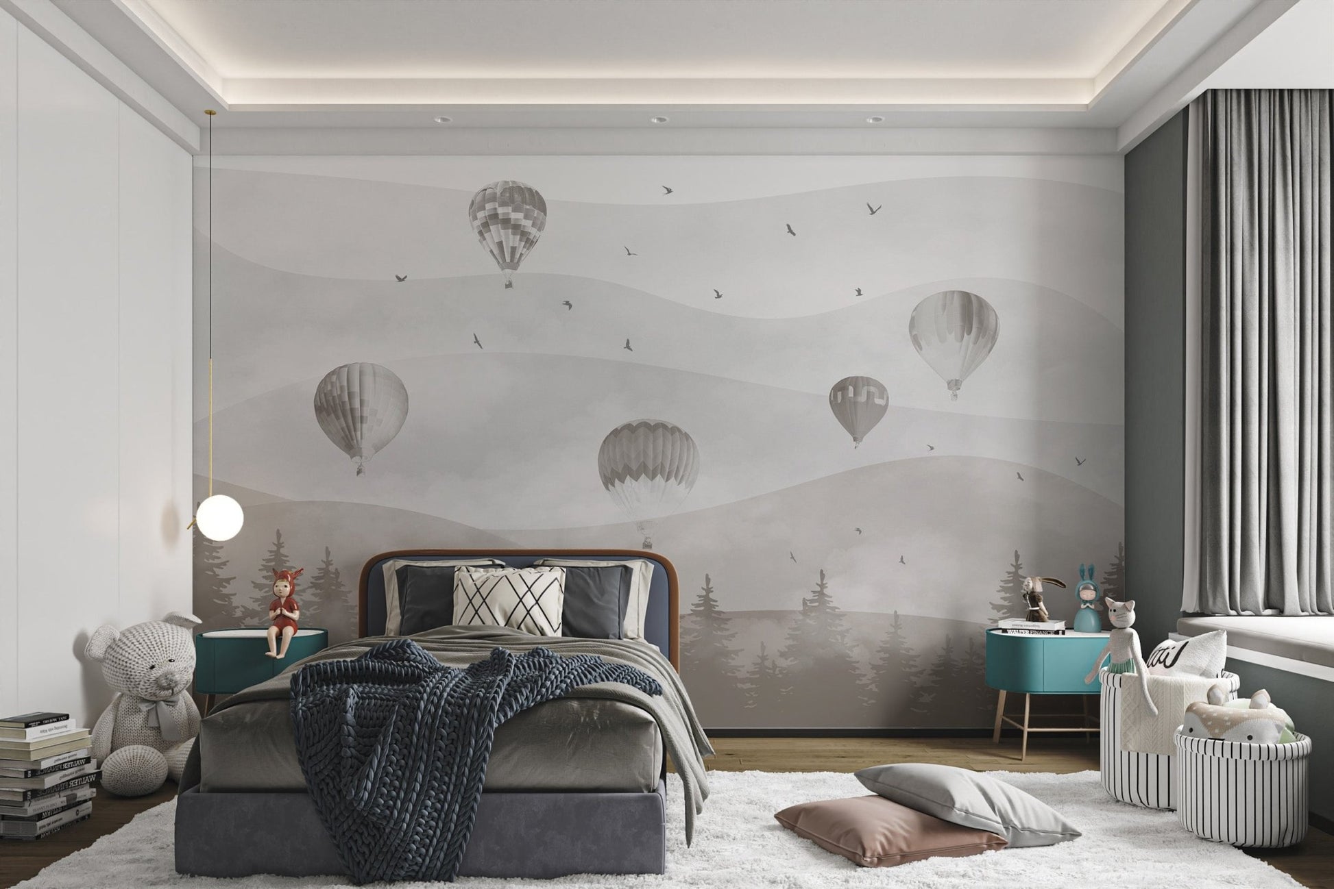 Artistic hot air balloons floating over hills wall mural in kids bedroom.