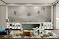 Minimalist brown forest wall mural with flying balloons for kids play area.