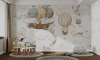 Hand-drawn style wall mural showing swans flying among soft clouds.