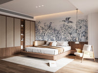 Hummingbird garden wall mural with detailed blossoms.