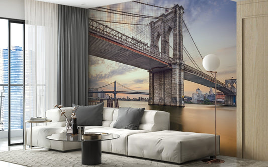 City skyline bridge wallpaper mural in a contemporary living room with a white sofa.
