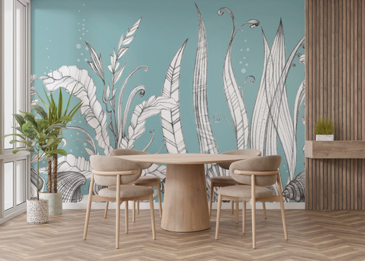 Teal floral wall mural in a modern dining room with a round oak table.