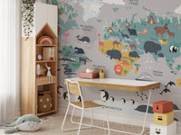 Animal map wall mural for a children's study desk area.
