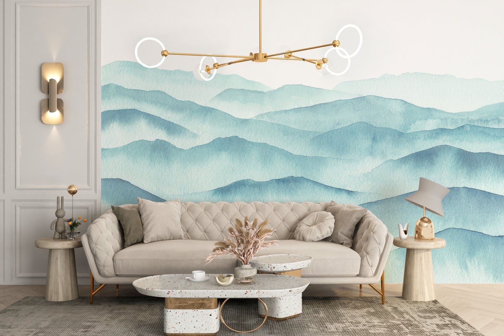 Stylish living room featuring indigo blue watercolor waves wall mural and beige furniture.