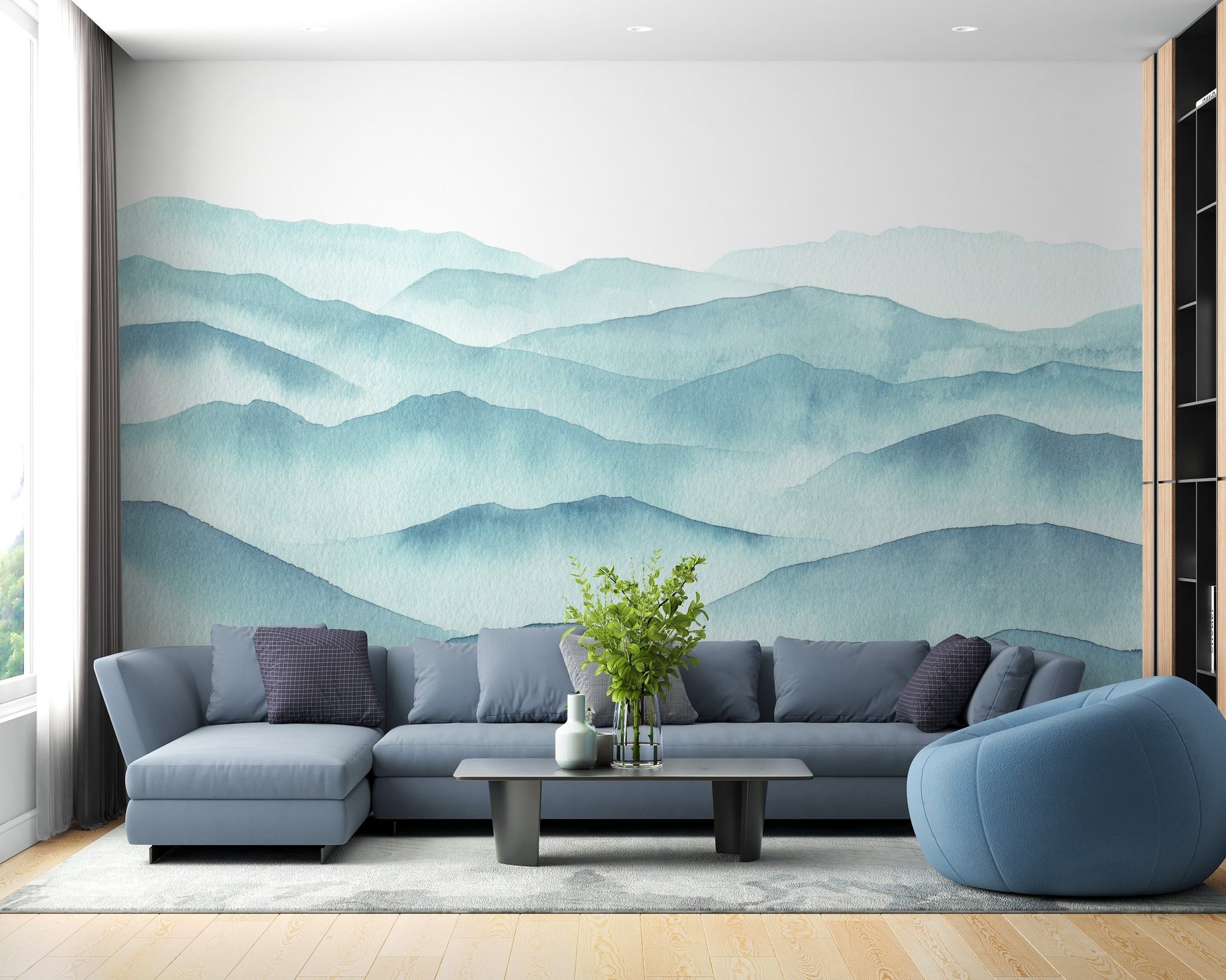 Large living room with blue abstract landscape wall mural and L-shaped sofa.