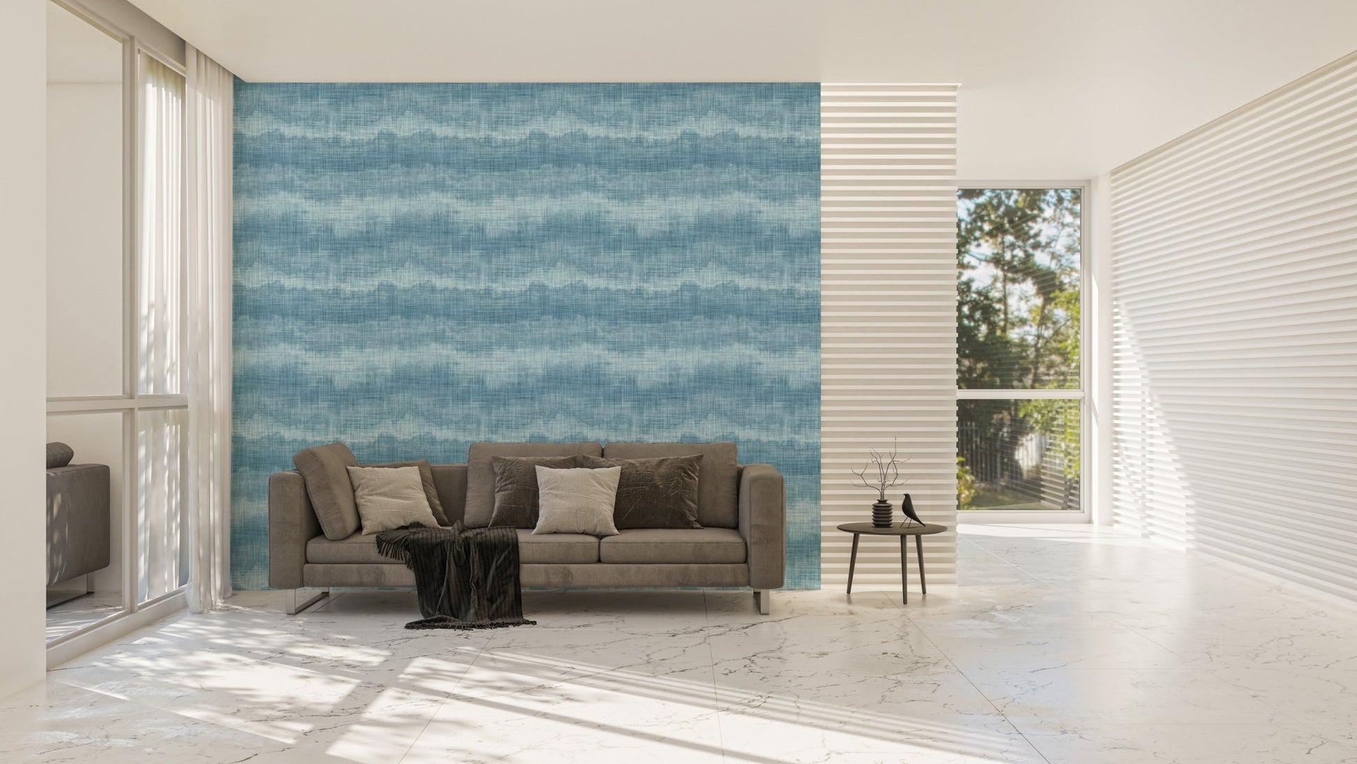 Horizontal blue wave wallpaper on a large feature wall in a minimalist living room.