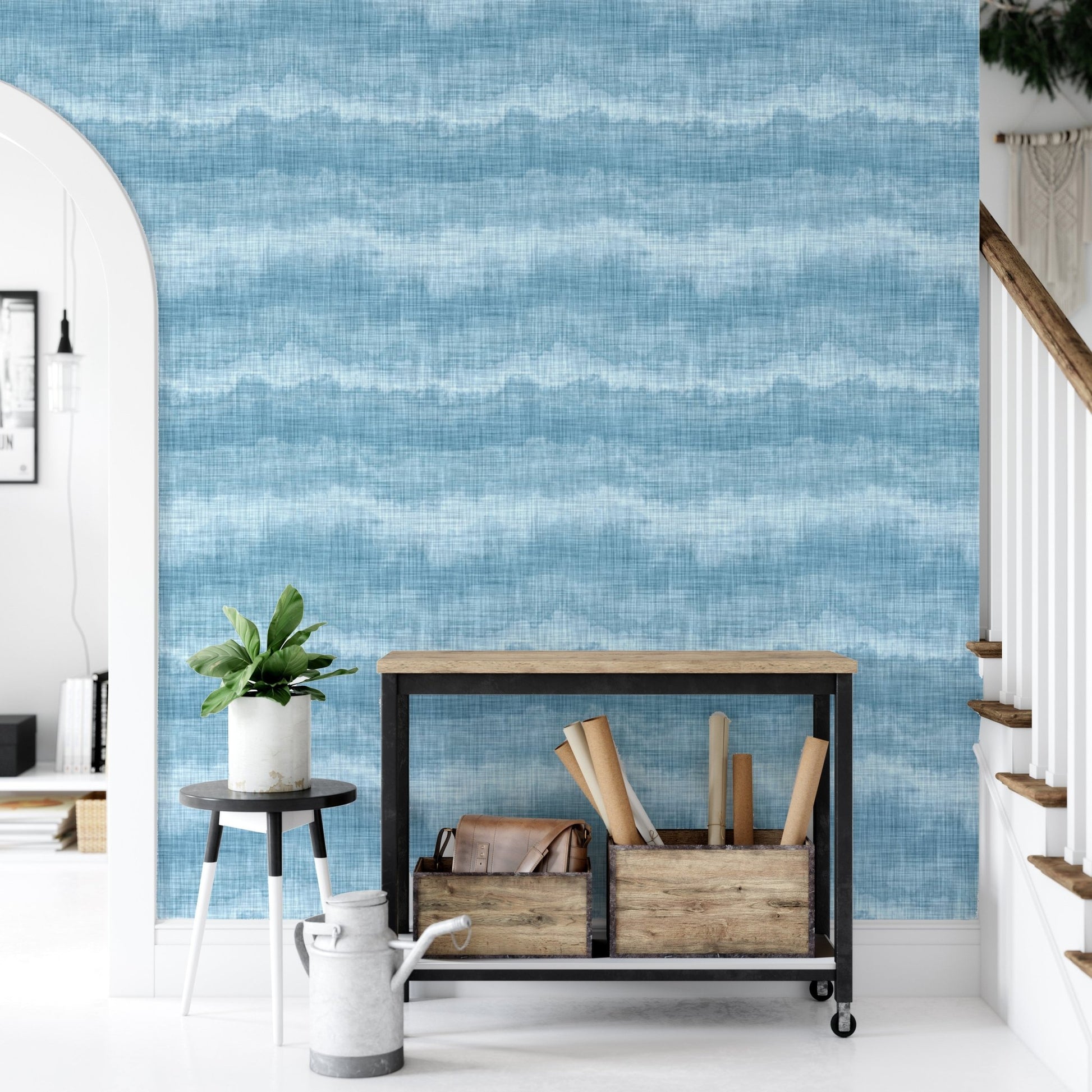 Marine texture wallpaper in a hallway with a metal shelf and white pitcher.