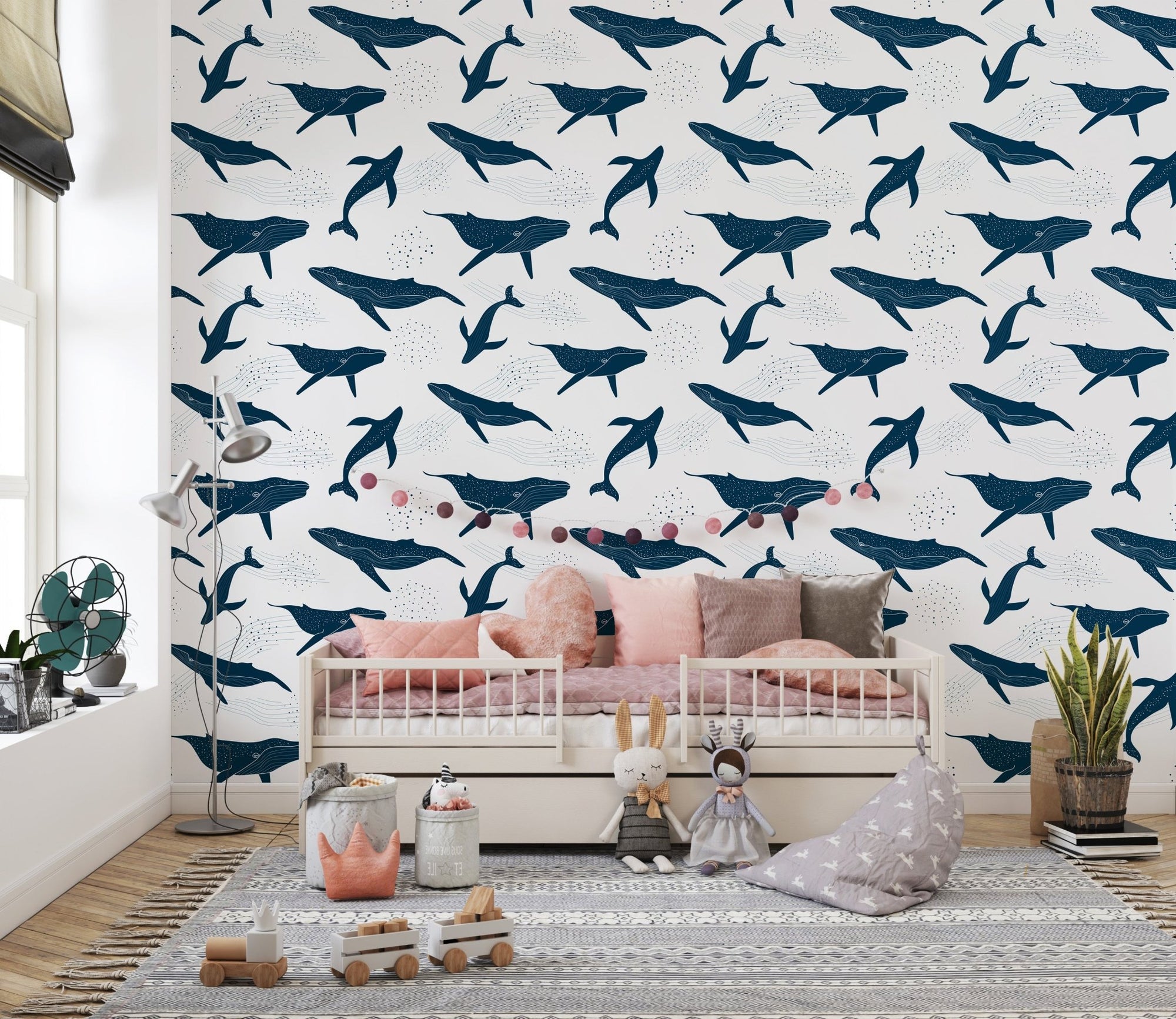 Ink Blue Whales in Monochrome Wallpaper in a kids bedroom with a daybed.