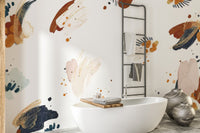 Self-adhesive mural with bold inkblot patterns for unique bathroom walls.
