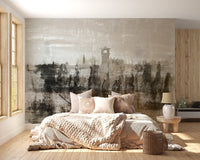 Light beige bedding in a bedroom featuring a landscape ruins wall mural.