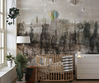 Nursery with a wooden crib and a neutral Inked Ruins Wall Mural.