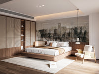 Moody ink ruins wall mural in bright bedroom.