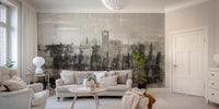 Expressive black-and-white ruins mural in living area.