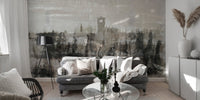 Crumbling architecture ink mural in minimalist living room.