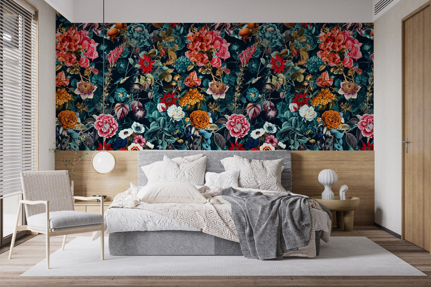 Dark botanical floral wallpaper behind a large bed in a bright bedroom.