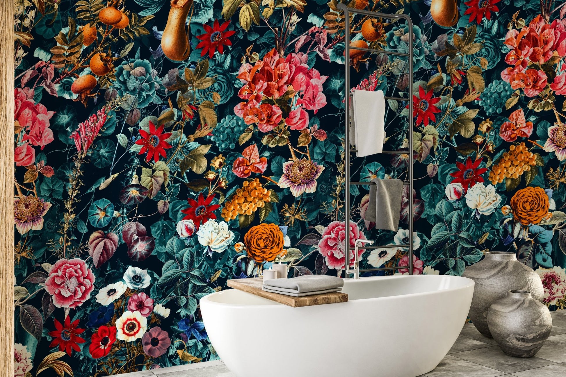 Floral wallpaper mural behind a luxury bathtub in a modern bathroom.